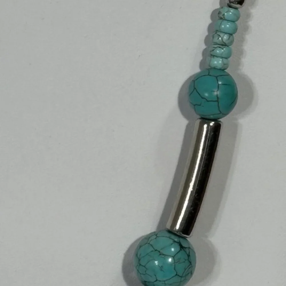 Silver-tone and turquoise-colored 18